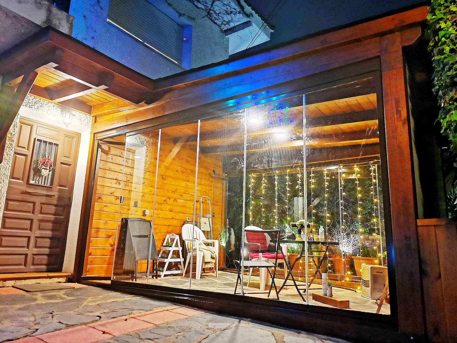 Ganando espacio de hogar con porche acristalado.